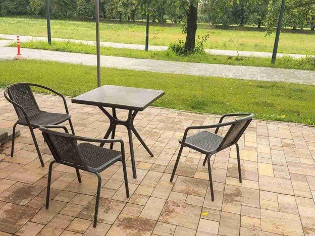 Completed concrete patio with outdoor seating area and clean paver layout in Columbia Station, OH