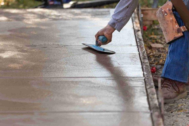 Newly installed concrete driveway with smooth finish and clean layout at residential home in Columbia Station, OH